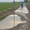 Jalan Poros Desa Cikande Kecamatan Cilebar Kabupaten Karawang.