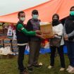 Bawaslu Jatim dan Bawaslu Kabupaten Lumajang saat memberikan bantuan korban erupsi gunung Semeru.