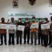 KPH Madiun  menyerahkan dana sharing Rp 518 Juta kepada 45 Lembaga Masyarakat Pengelola Sumber Daya  Hutan (LMPSDH) di Aula Kantor Perhutani KPH Madiun, Kamis (30/12).