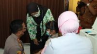 Polres Bangkalan, saat  menggelar vaksinasi merdeka untuk anak anak usia 6-11 di ruang Serbaguna Mapolres Bangkalan, Rabu (19/1/2022).