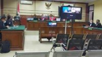 JPU KPK Wawan Yunarwanto, saat menyidangkan perdana anggota DPR RI Hasan Aminuddin dan istrinya Bupati Probolinggo Putut Tantriana di Pengadilan Tipikor Surabaya, Selasa (25/1/2022).