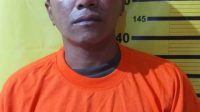 HS (38) th, tersangka perampasan HP yang di amankan Unit Reskrim Polsek Tambaksari Polrestabes Surabaya.Jumat (4/2/22)