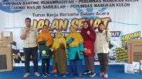 PRM - PRA dan Takmir Masjid Sabilillah Perumnas Manukan kulon bersama DPD SWI Surabaya, saat gelar jalan sehat, Minggu (12/3/2023)