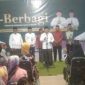 Bupati Jember menyampaikan sambutan kepada masarakat Desa Kepanjen