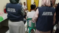 DP3AP2KB Kota Depok memberiaan pendampingan kepada keluarga korban pencabulan anak di Tapos. (foto: UPTD PPA)