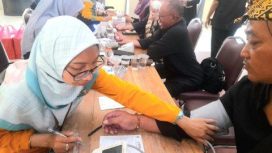 Proses Skrining kepada para tamu undangan Dialog Publik SWI Depok