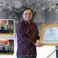 Kapolres Jember AKBP Bayu Pratama Gubumagi SH,SIK,MSI,saat terima penganugerahan kompolnas Award 2024