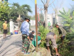 Satgas TMMD Kodim 0816/Sidoarjo Bersama Warga RT 11 Gotong Royong Siapkan Landasan Pengaspalan Jalan