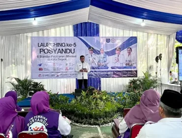 Sekda Kota Depok,  Mangnguluang Mansur memberikan sambutan pada Peresmian Posyandu Matahari RW 18 Kelurahan Mekarsari Kecamatan Sukmajaya dengan enam SPM. (Dok. Diskominfo)