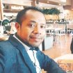 Omega DR Tahun, S.KM., S.H., M.Kes.,